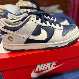 Nike Dunk Low in Dark Blue and Cream